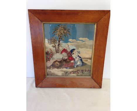 A framed & glazed antique religious tapestry.  