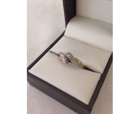 Ladies serpent ring, tests as 9ct gold size approx O, weight approx 1.7g.  