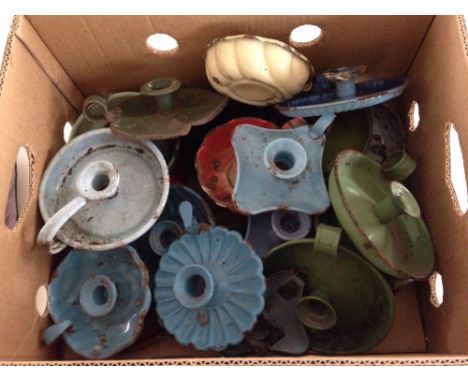 A box of assorted vintage enamel candle holders  