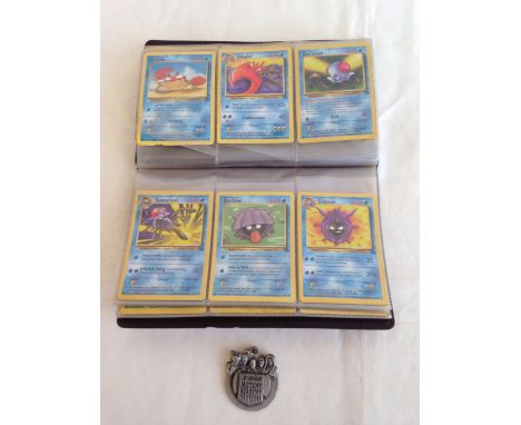 A case of collectable pokemon cards with x men medallion.