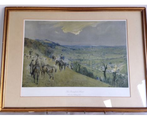 A framed & glazed hunting print 'The Beaufort Hunt' by Lionel Edwards. 49 x 69cm.  