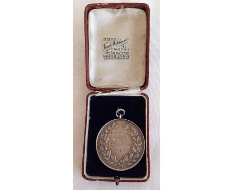 A silver prize medallion marked "K.L & D.  M.B.A Breadshow 1927" to front and "Class 2 21lb Cottage Loaf Ely & Son. Kings Lyn