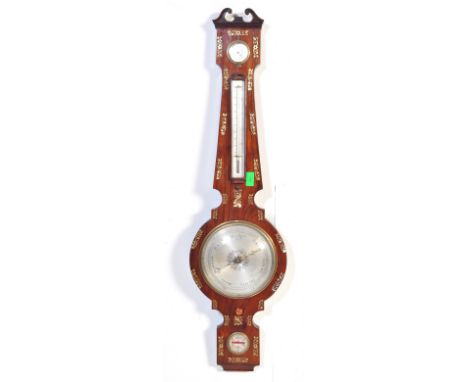 A Victorian 19th century rosewood wheel barometer with mother of pearls inlaid floral detailing. It measures approx; 102cm ta