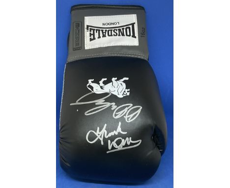 Daniel Dubois &amp; Frank Warren Signed By Both In Silver On A Black Boxing Glove. Good condition. All autographs come with a