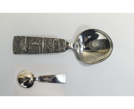 Swedish Caddy Spoon with modernist design by Hallberg decorated with scenes from Stockholm with makers marks to the rear