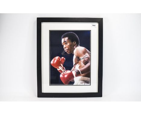 Boxing Interest. Signed photo Sugar Ray Leonard. Black glazed frame. Ideal collectors or charity auction item. Overall size i