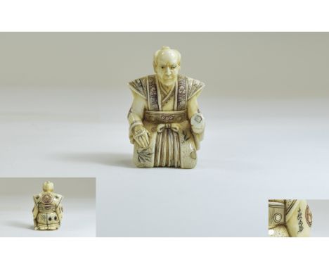 Japanese - Finely Carved and Signed Ivory Netsuke From The Meiji Period 1864 - 1912 ' Old Man ' In a Kneeling Position holdin