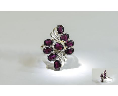 Indian Garnet Cluster Ring, red garnet with hints of blackcurrant, totalling 6.75cts set in a stylish silver lozenge design, 