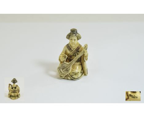 Japanese Very Fine and Signed Carved Ivory Netsuke From The Meiji Period 1864 - 1912 - Japanese Noble Lady Playing a Musical 