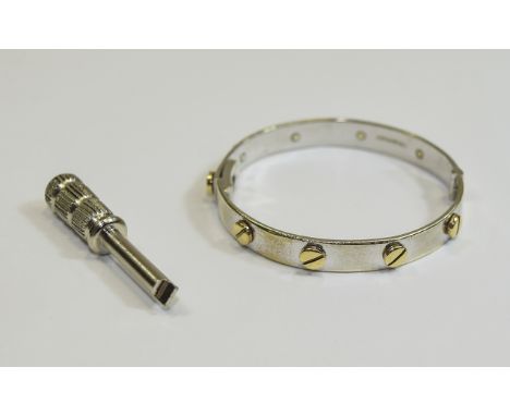 Child's 9ct White Gold Cartier Style Bangle.  Hinged opening, with steel screwdriver. Fully hallmarked 
