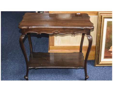 Occasional Table Dark wood rectangular table with bottom shelf. Curved legs. Approx dimensions of table top 28.5 x 15.5 Inche