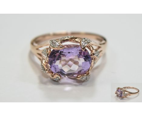 Rose De France Amethyst Ring, an oval cut solitaire of 3cts set across the finger, in rose gold vermeil, with .25ct natural w