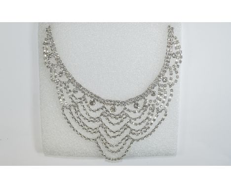 White Crystal Multi Loop Necklace, Edwardian vintage style with increasing rows of small bright, white crystal loops, suspend