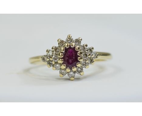 9ct Gold Ruby Cluster Ring set with a central Ruby surrounded by round cut Diamonds, fully hallmarked. Ring SIze R