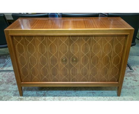 GORDON RUSSELL HELIX SIDEBOARD, 89cm H x 123cm H x 47cm D, walnut with two incised doors, enclosing a shelf. 