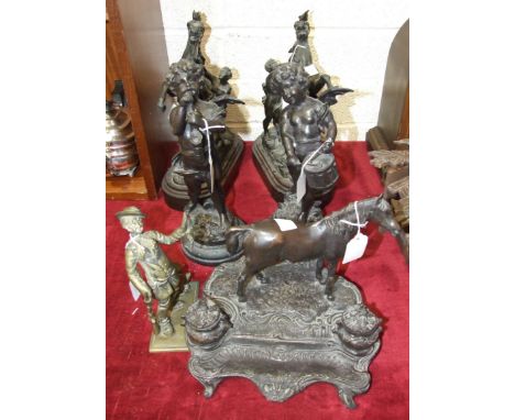 After Mené, a bronzed pen and ink stand fitted with two ink wells and surmounted by a stallion, signed 'Mené', 22cm high, aft
