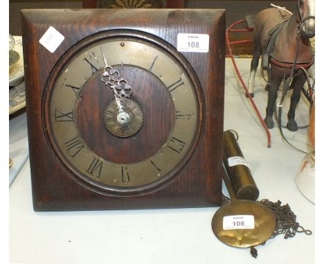 A stained wood square postman's alarm wall clock by Lovejoy & Co, Wimbledon, 25cm square.