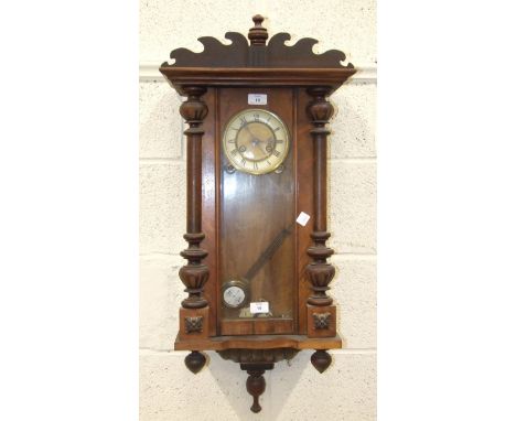A Continental rosewood Vienna-style striking wall clock, the dial marked 'Germany', 82cm high.