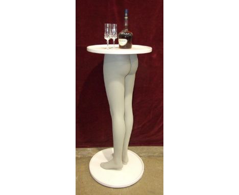 A circular table constructed from a pair of shop mannequin legs, 51cm diameter, 110cm high.