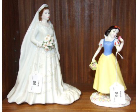 A Royal Worcester figurine 'HM Queen Elizabeth II as a bride - Diamond Wedding Anniversary', 23cm high and a Royal Doulton fi