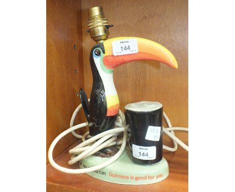 A Carltonware-style 'Guinness' Toucan table lamp, 16cm high overall.