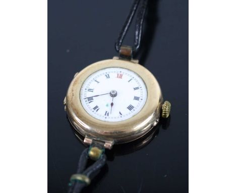 A lady's vintage 9ct gold cased dress watch, having unsigned white enamel Roman dial and manual wind movement, case dia.28mm