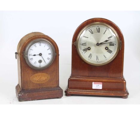 An Edwardian mahogany and boxwood strung mantel clock, h.20cm; together with another similar (2)