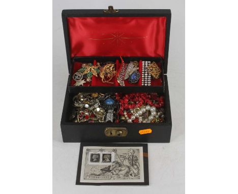 A box of miscellaneous costume jewellery to include paste set bar brooch, gilt metal dress ring, cruciform pendant, faux pear