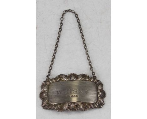 A silver and embossed decanter collar annotated for Whisky, 0.4oz, 6cm