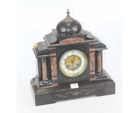 A 19th century black slate and rouge marble mantel clock, of architectural form, the enamelled chapter ring showing Arabic nu