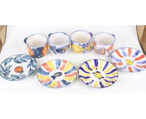 A set of four Kate Glanville tea cups and saucers, saucer dia.18cm 