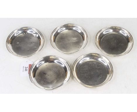 A set of five silver coasters each with engine turned decoration, 6.6oz, dia. 9.5cm
