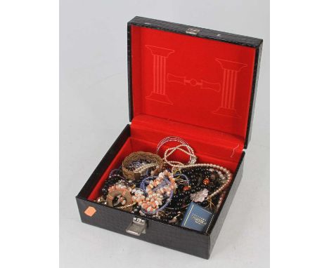 A jewellery box and contents of assorted costume, largely being necklaces but to include hinge bangle etc