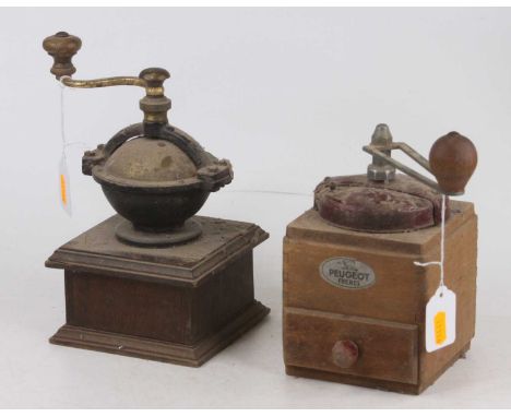 A vintage Peugeot Freres coffee grinder, height 21cm, together with another similar