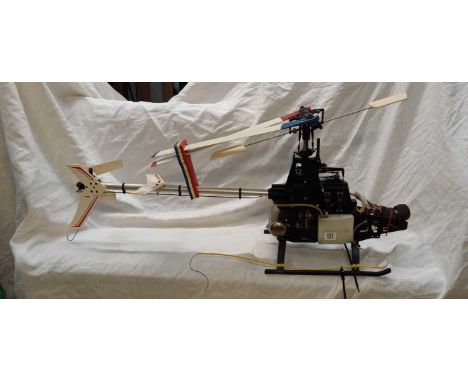 R.C HELICOPTER OF UNKNOWN MAKE WITH MAIN ROTOR BLADES, NO BODY WITH ENGINE, SOLD AS SEEN