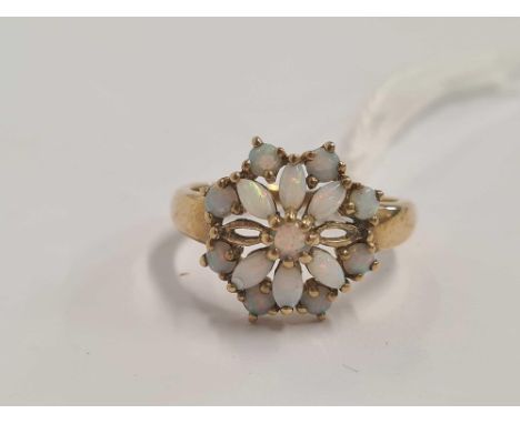 AN OPAL FLOWER HEAD RING SET IN 9ct (2 STONES MISSING), SIZE 'N'