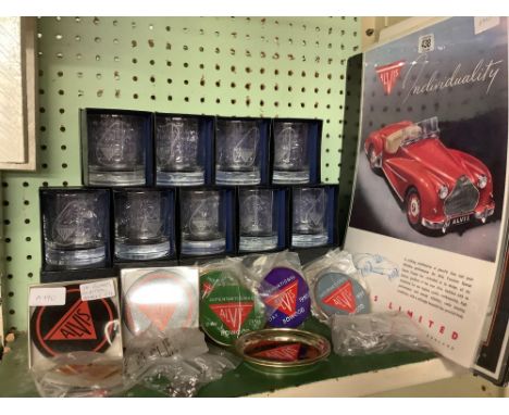 SHELF OF ALVIS CAR MEMORABILIA INCL: WHISKY GOBLETS, COASTERS, BADGES, POSTERS ETC