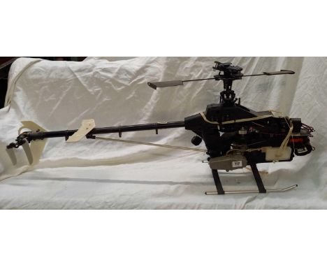 R.C HELICOPTER OF UNKNOWN MAKE, NO MAIN ROTOR BLADES OR BODY, WITH ENGINE SOLD AS SEEN