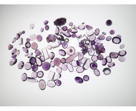 Loose gemstones: Amethyst and amethyst coloured stones, largest stone weighing 8.45cts gross weight 72.6gPlease note gemstone