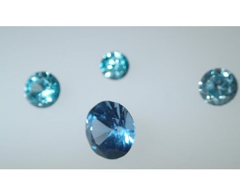 Loose gemstones: Four graduated blue topaz stones, largest weighing 3.05cts, D: 9mmPlease note gemstones listed have been tes