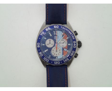 Tag Heuer Sport Detail wristwatch on a blue leather strap with box RRP £1340.00. Working at lottingP&P group 1 (£16 for the f