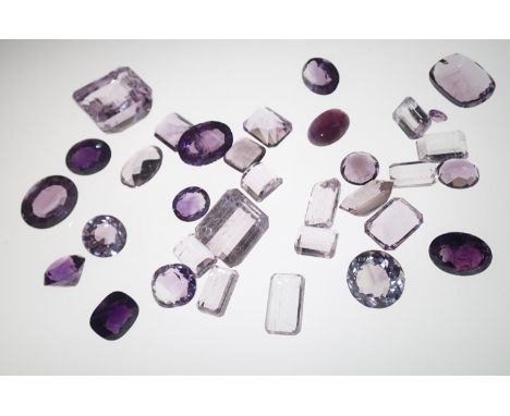 Loose gemstones: Amethyst and amethyst coloured stones, largest stone weighing 79cts, 23.3mm x 19.9mm gross weight 86.9gPleas