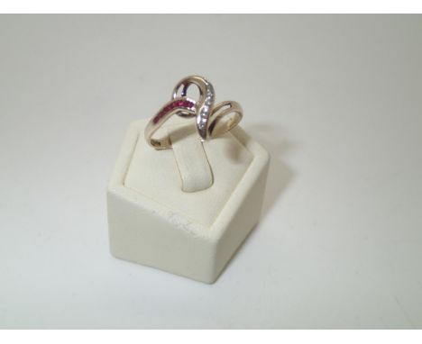 Modern 9ct gold ruby and diamond fancy ring, size Q, 1.8gP&P group 1 (£16 for the first item and £1.50 for subsequent items) 