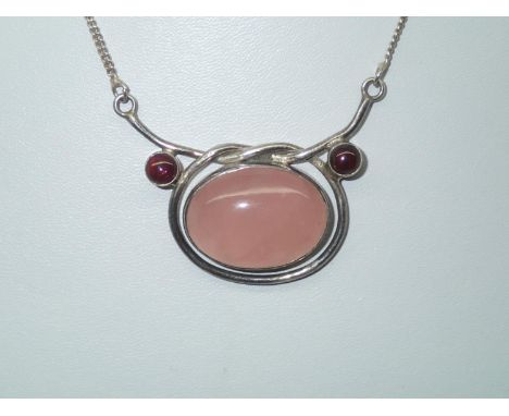 Contemporary sterling silver necklace with a large oval rose quartz pendant L: 42 cmP&P group 1 (£16 for the first item and £