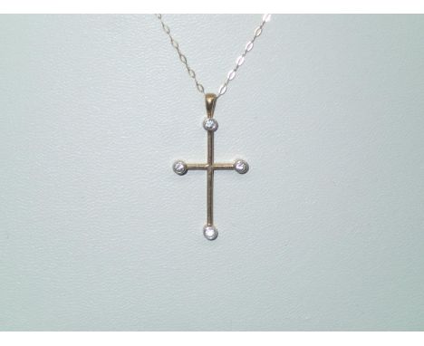 9ct gold and diamond cross pendant on a 9ct gold chain, 1.6gP&P group 1 (£16 for the first item and £1.50 for subsequent item