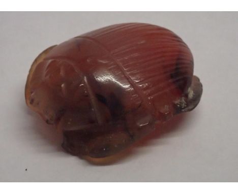 Loose gemstones: a carved agate scarab 26mm x 22.7mm. The underside is carved alsoPlease note gemstones listed have been test