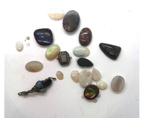 Loose gemstones: Opals, largest stone weighing 8.25cts, 16.9mm x 14.8mm gross weight 13.8gPlease note gemstones listed have b