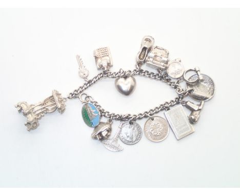 Vintage Silver Charm Bracelet with 15 charms including Georg Jensen driving licence 56gP&P group 1 (£16 for the first item an