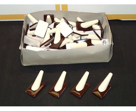 Approximately 40 new leatherette ring standsP&P group 2 (£20 for the first item and £2.50 for subsequent items) 