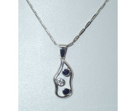 A contemporary 18ct white gold sapphire and diamond pendant on an 18ct white gold chain, 4.9gP&P group 1 (£16 for the first i